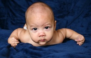 Image of baby looking thoughtful