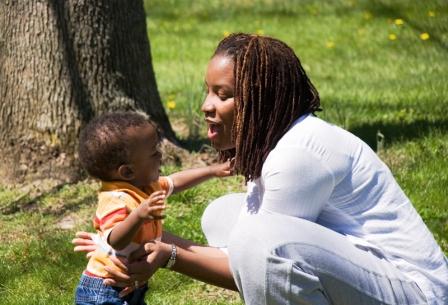 Babies and Children with Autism Sign Language Helps. Photo of Mother with baby